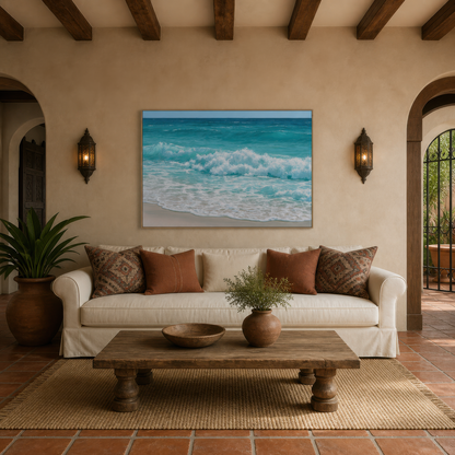 Wide turquoise wave artwork above a cream sofa with rust pillows in a plaster room with wall sconces