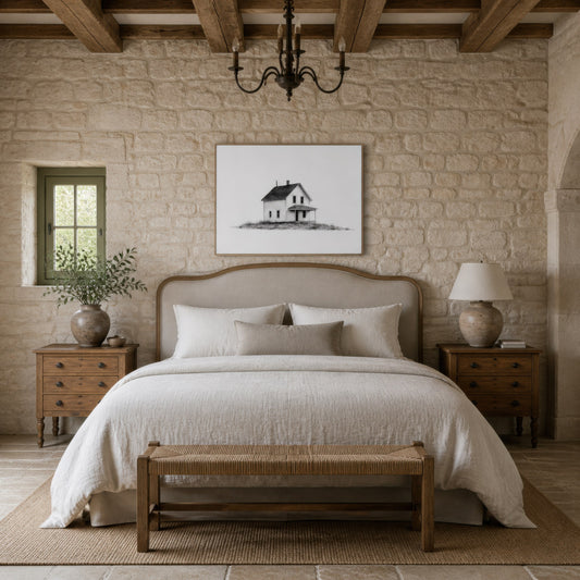 Farmhouse with a flat-roofed porch above a wooden bed with cream bedding on white brick