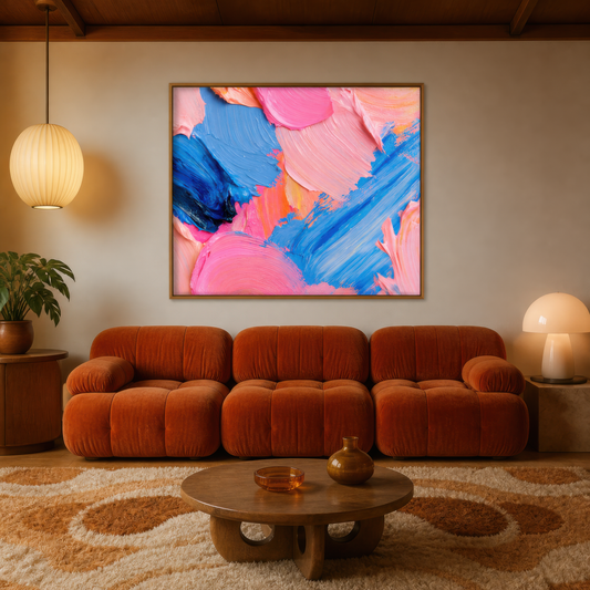Technicolor bloom above a rust boucle sofa with a round wood table and a paper lantern