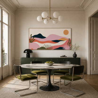 Coral desert mountain sunset above a round dining table with olive green chairs
