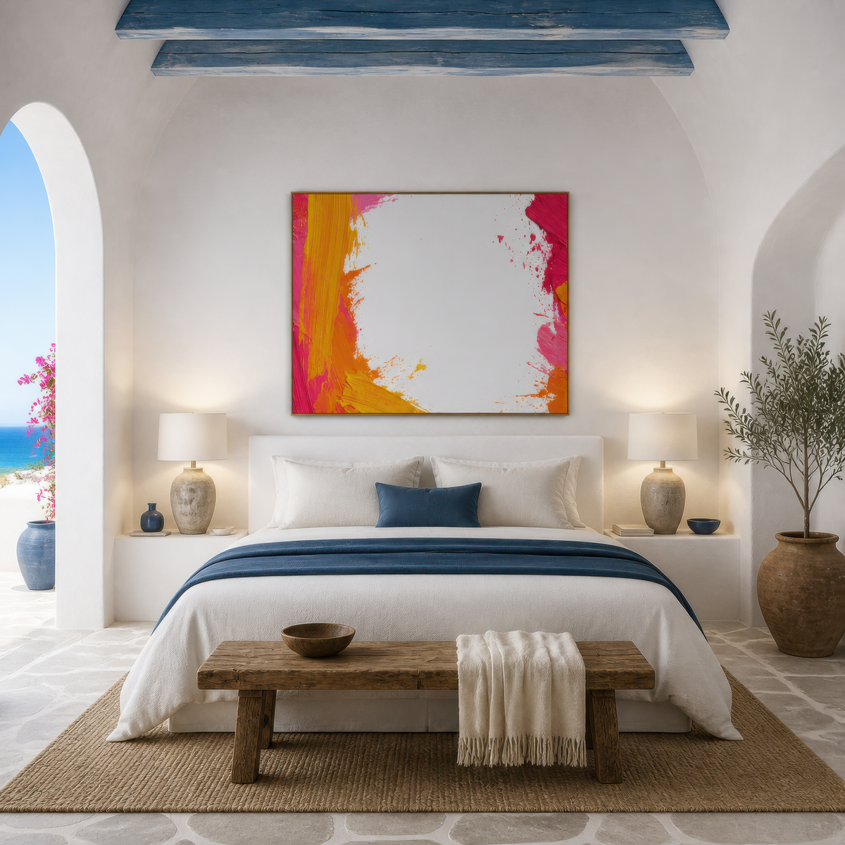 Candy current above a white bed with a navy runner beside an arched window