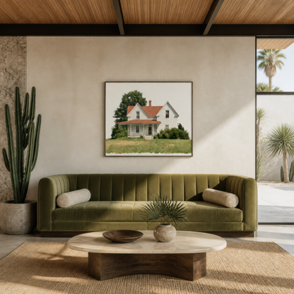 White farmhouse illustration above an olive green channel sofa on a stone wall