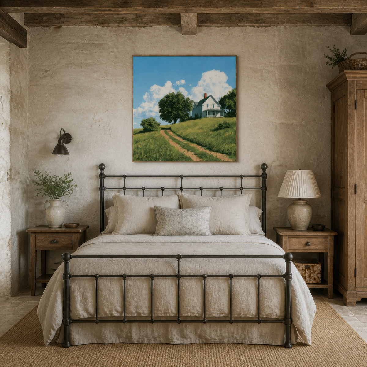 Green hillside farmhouse above a black iron bed with cream bedding on a rough plaster wall