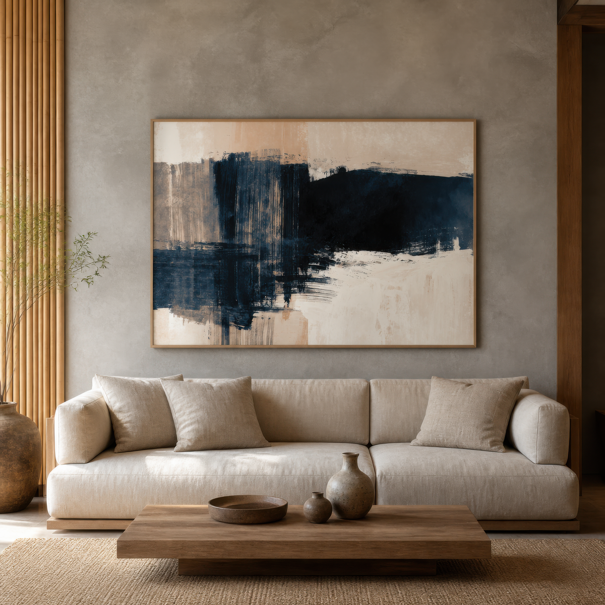 Indigo brushstroke horizon above a cream sofa on a plaster wall with pale wood