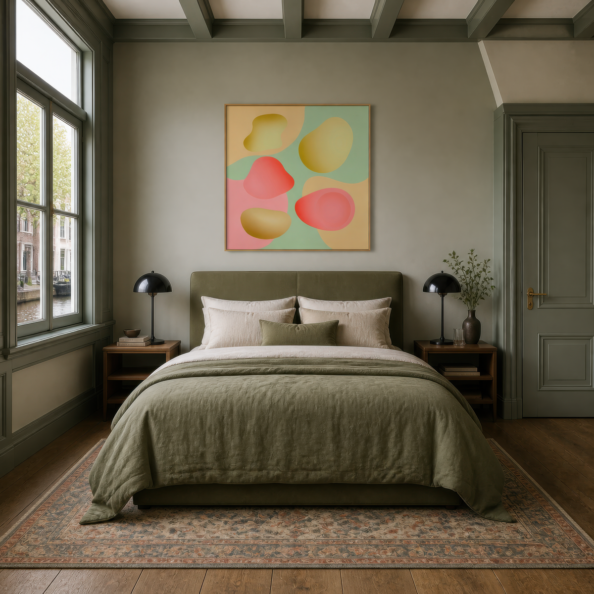 Soft pastel blooms above a bed with olive bedding and black dome lamps on a sage wall