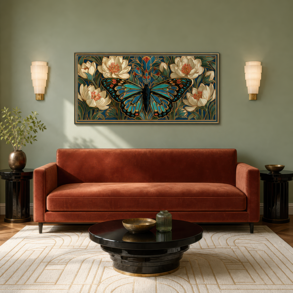 Jade butterfly motif above a rust velvet sofa on a sage green wall with alabaster sconces