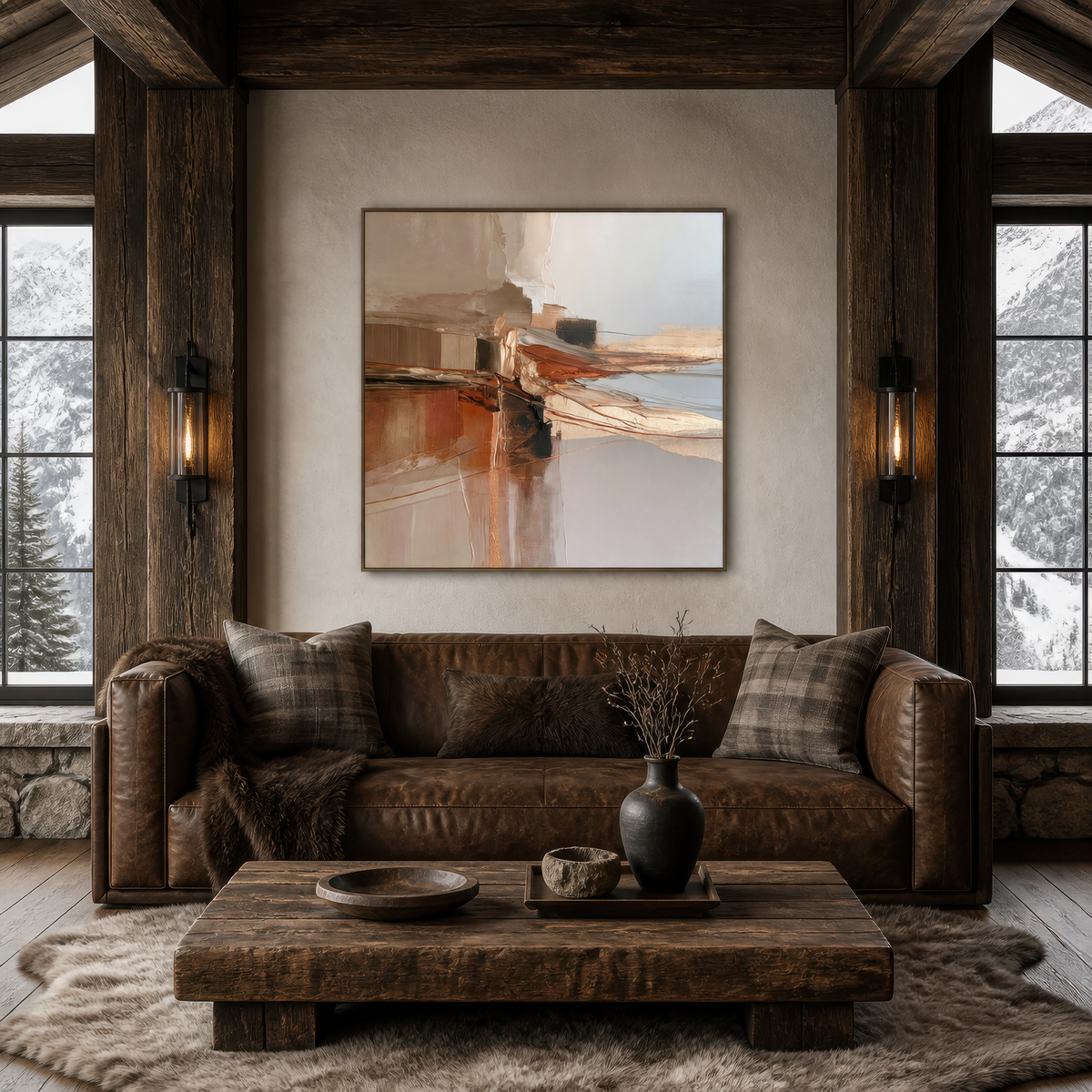 Square terracotta and gray abstract artwork above a brown leather sofa in a rustic living room