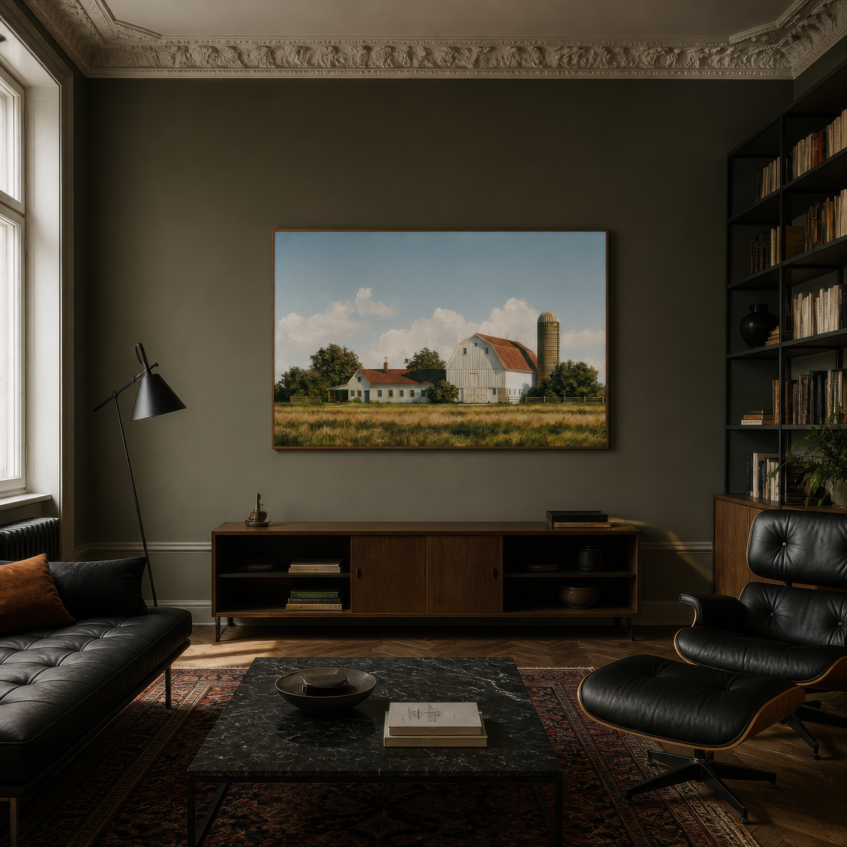 Golden barnyard above a black media console with a leather lounge chair and bookshelves