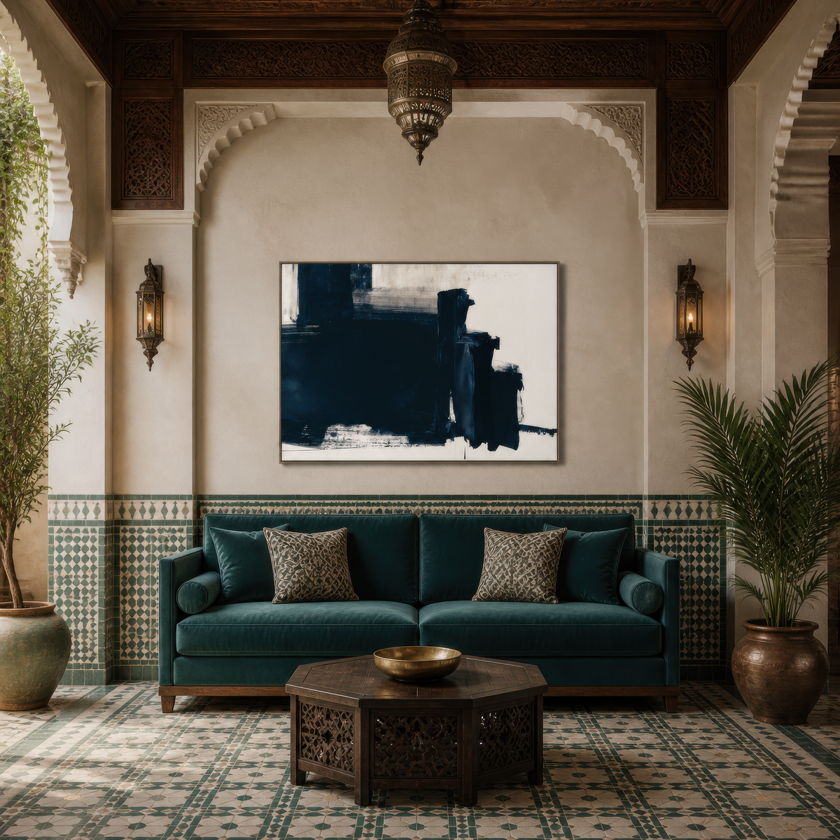 Large black and navy abstract artwork above a teal sofa in a room with an arched alcove and patterned tiles