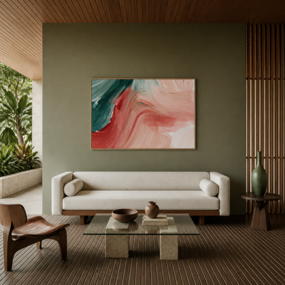 Flowing brushstroke abstract above a white sofa on an olive wall beside a wood screen