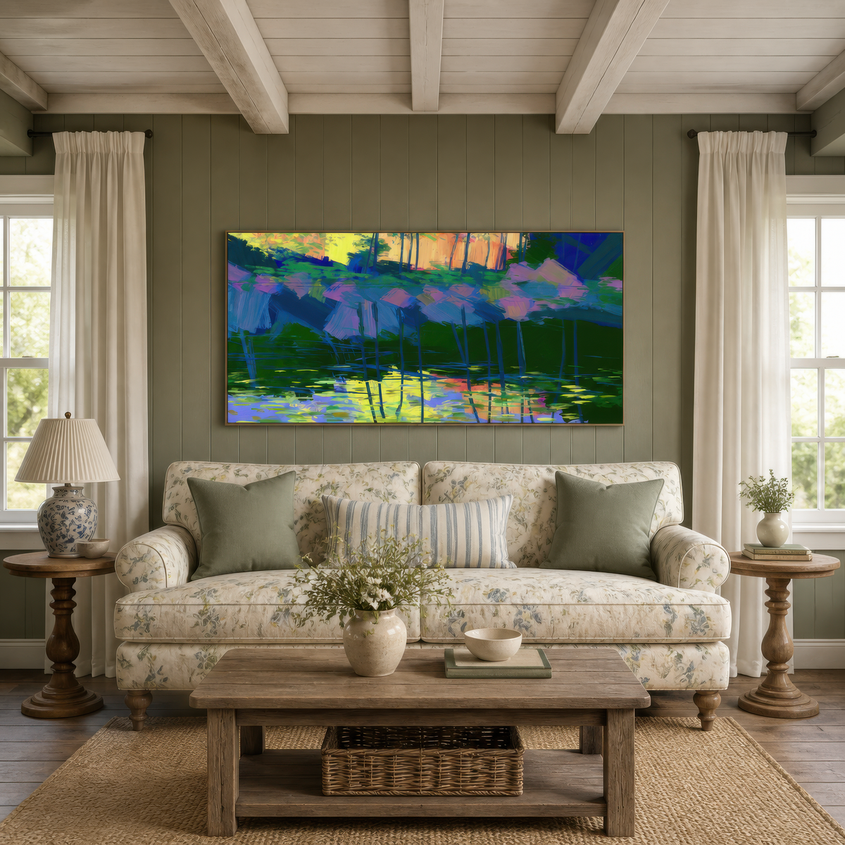 Pink blossom pond above a cream sofa between two windows with side tables and cream shaded lamps