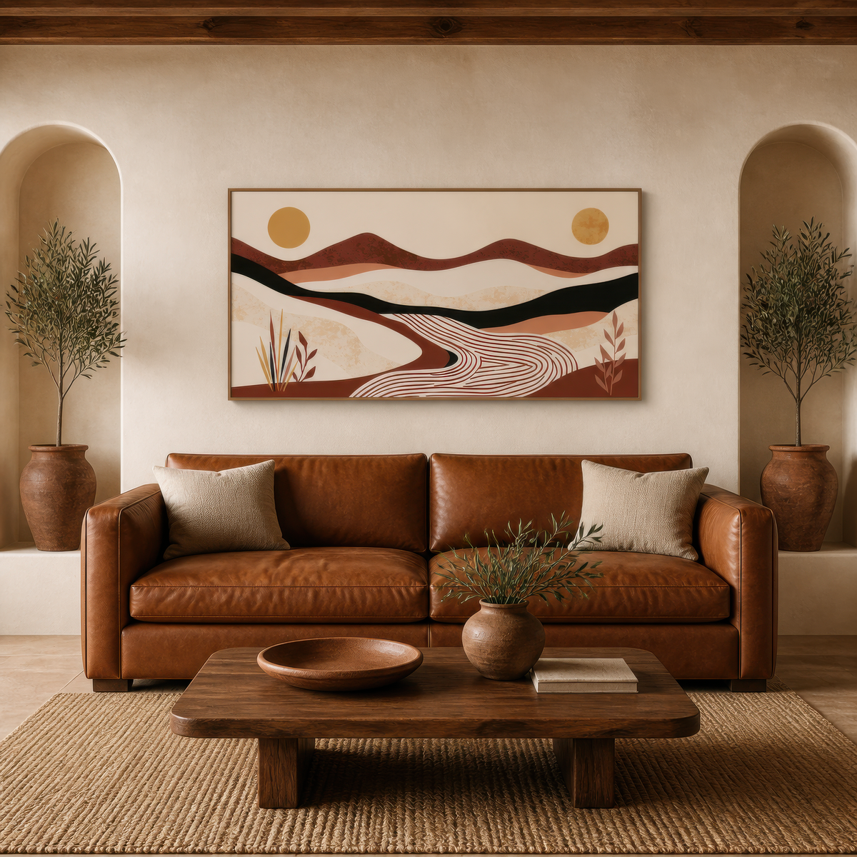 Desert river valley abstract above a tan leather sofa between two plaster arches