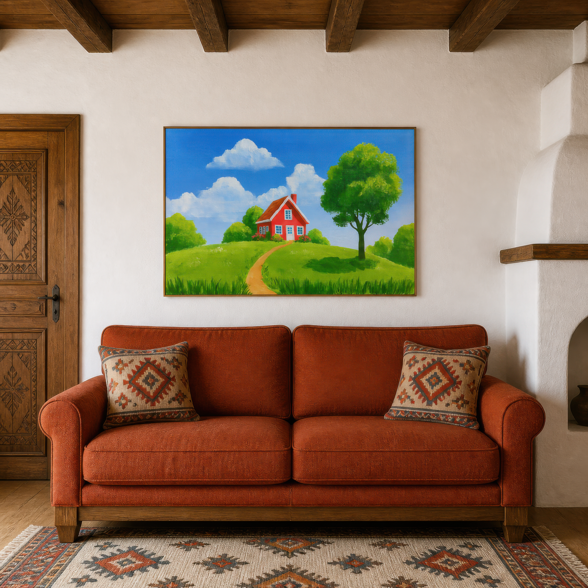 Red cottage on the green above a rust terracotta sofa with kilim pillows and wood beams
