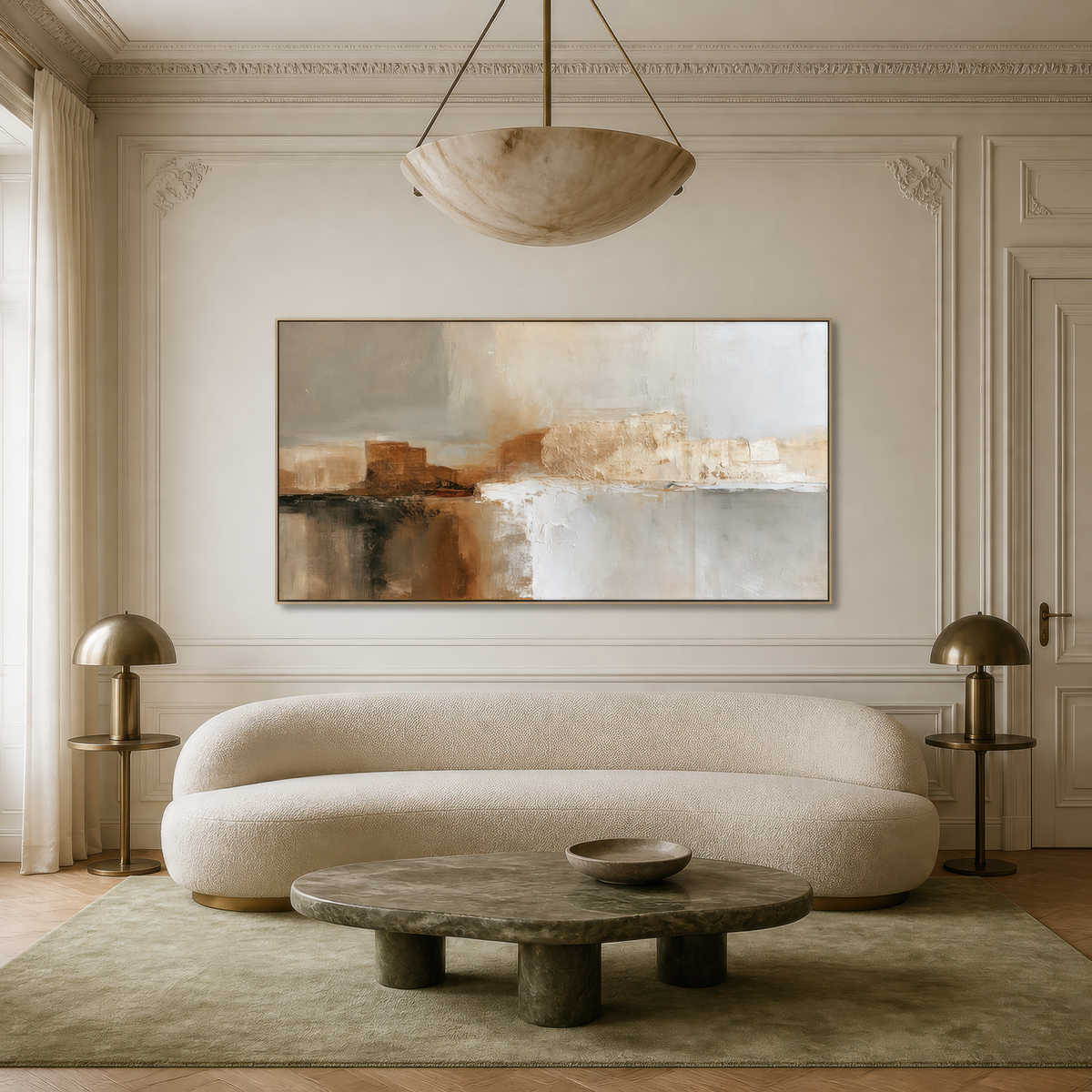 Wide terracotta and gray abstract artwork above a curved white sofa in a paneled living room