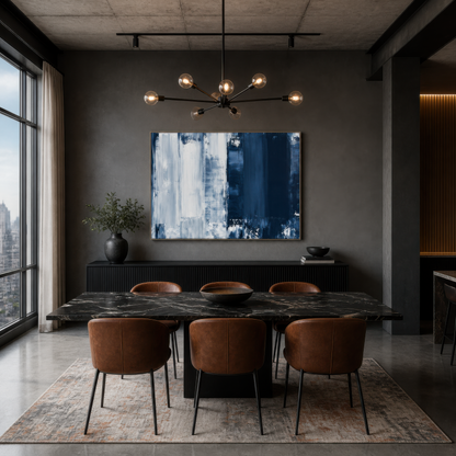 Large navy and white brushy abstract artwork above a dark sideboard in a charcoal dining room