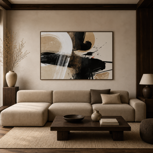Sumi-e ink abstract above a cream sectional with a dark wood low coffee table