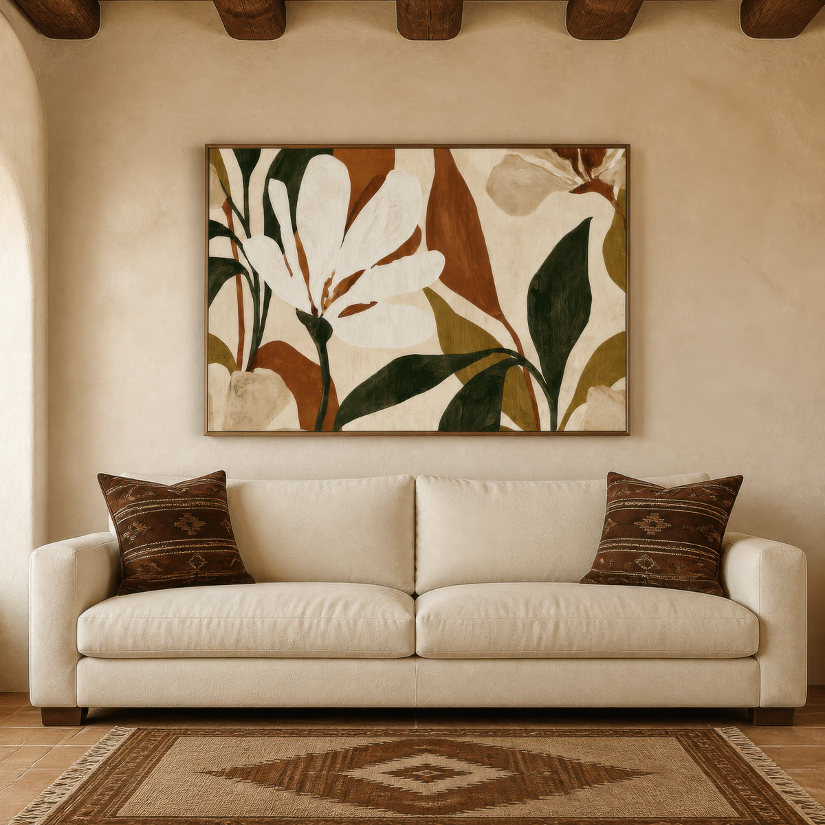 White magnolia artwork above a cream sofa in a plaster room with a patterned rug