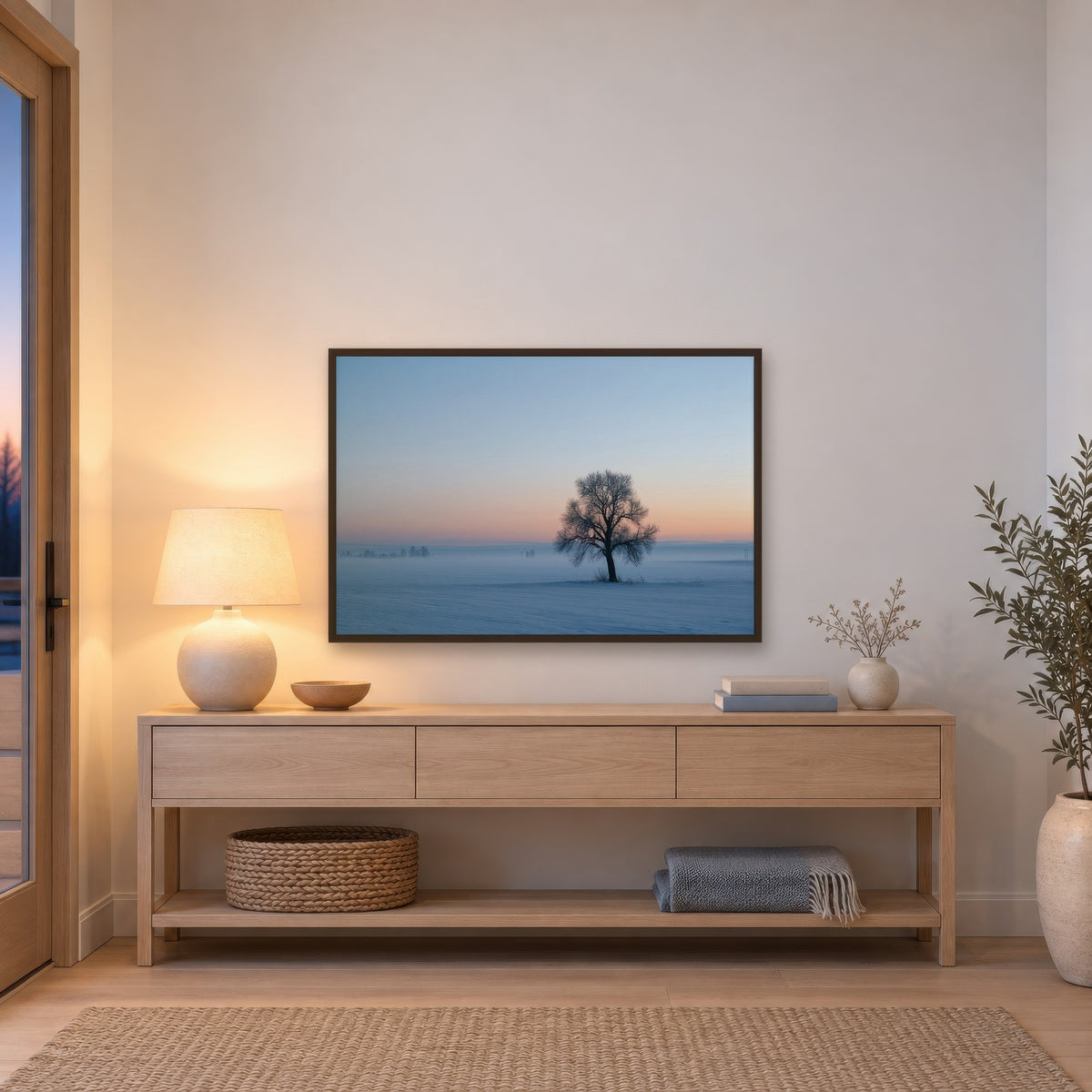 Lone Tree in Snowy Field scandinavian wall art in an entryway