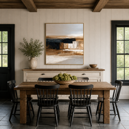 Tall brown and cream abstract artwork above a sideboard in a dining room with black chairs