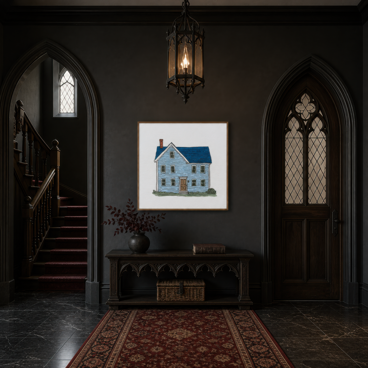 Blue farmhouse illustration above a dark console in a near black Gothic entryway